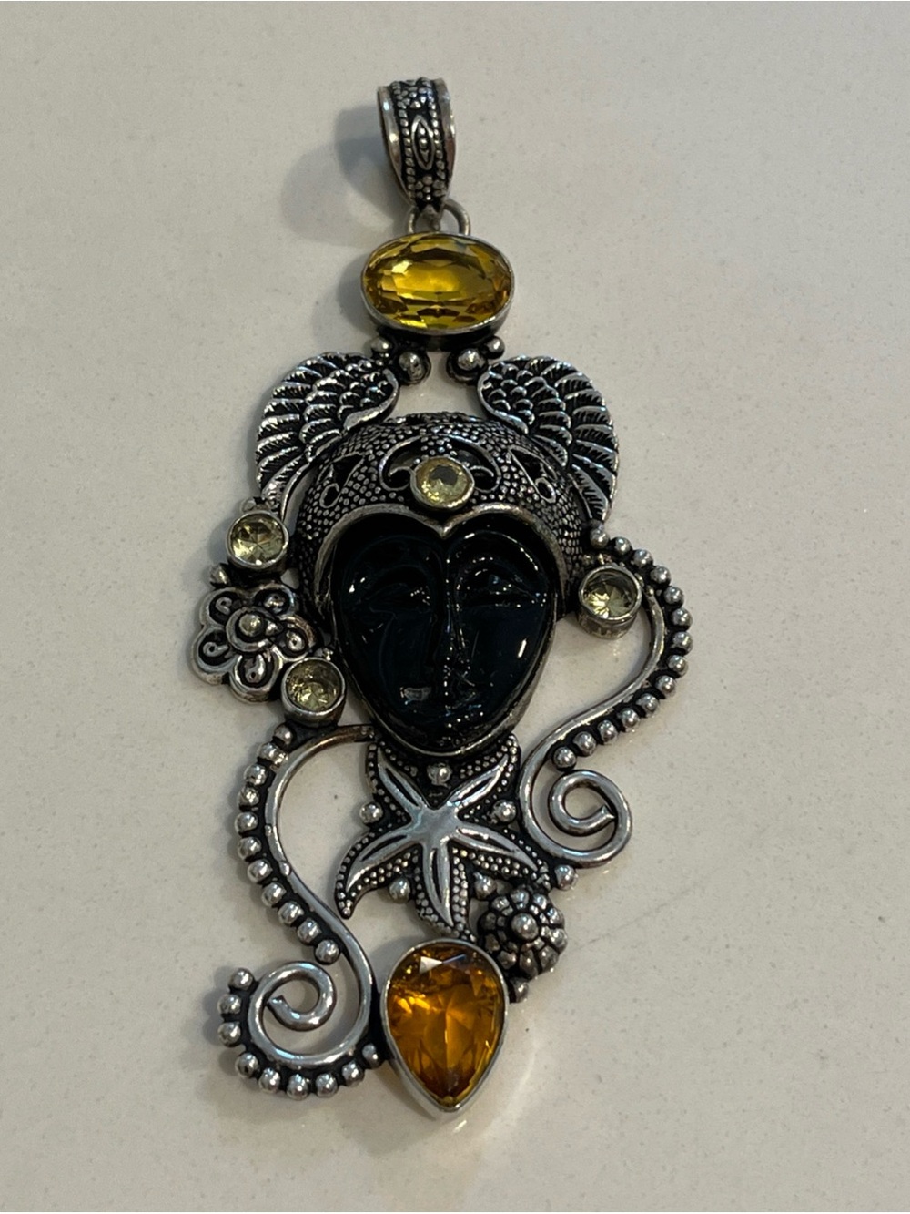 Sterling Silver925 Balinese Goddess pendant featuring Citrine stones Carved Face